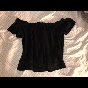 Woman’s black off the shoulder top size medium